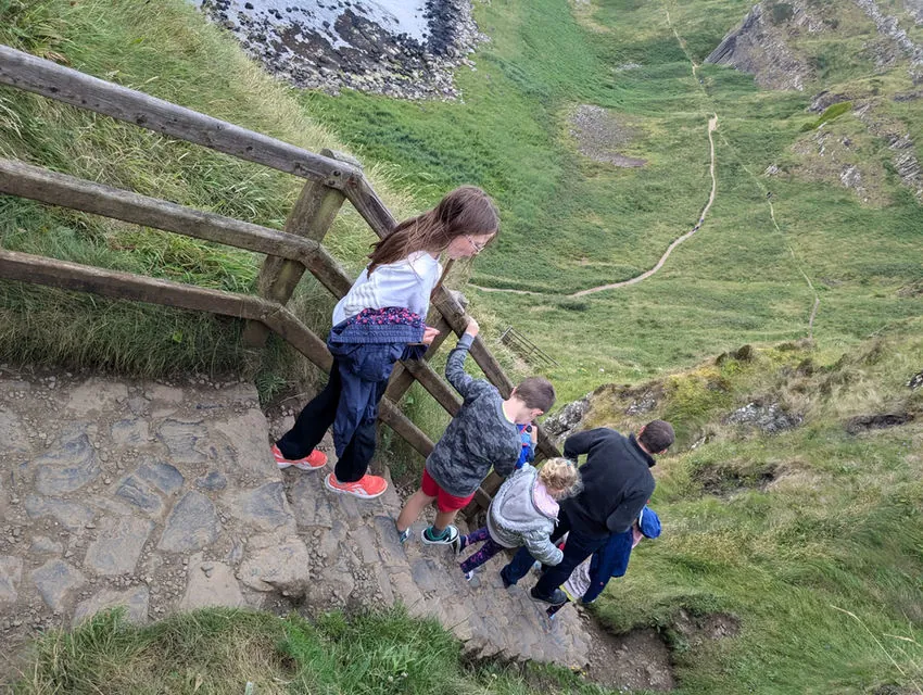 A family enjoying a walk together during an English immersion stay