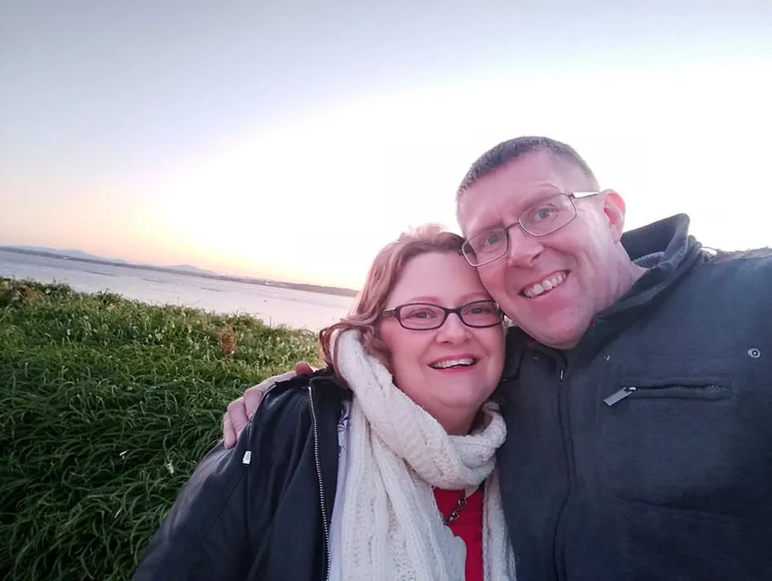 Sinéad and Keith Power-Quinn by the coast at sunset